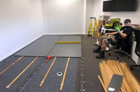 Laying floor and track mobile shelving